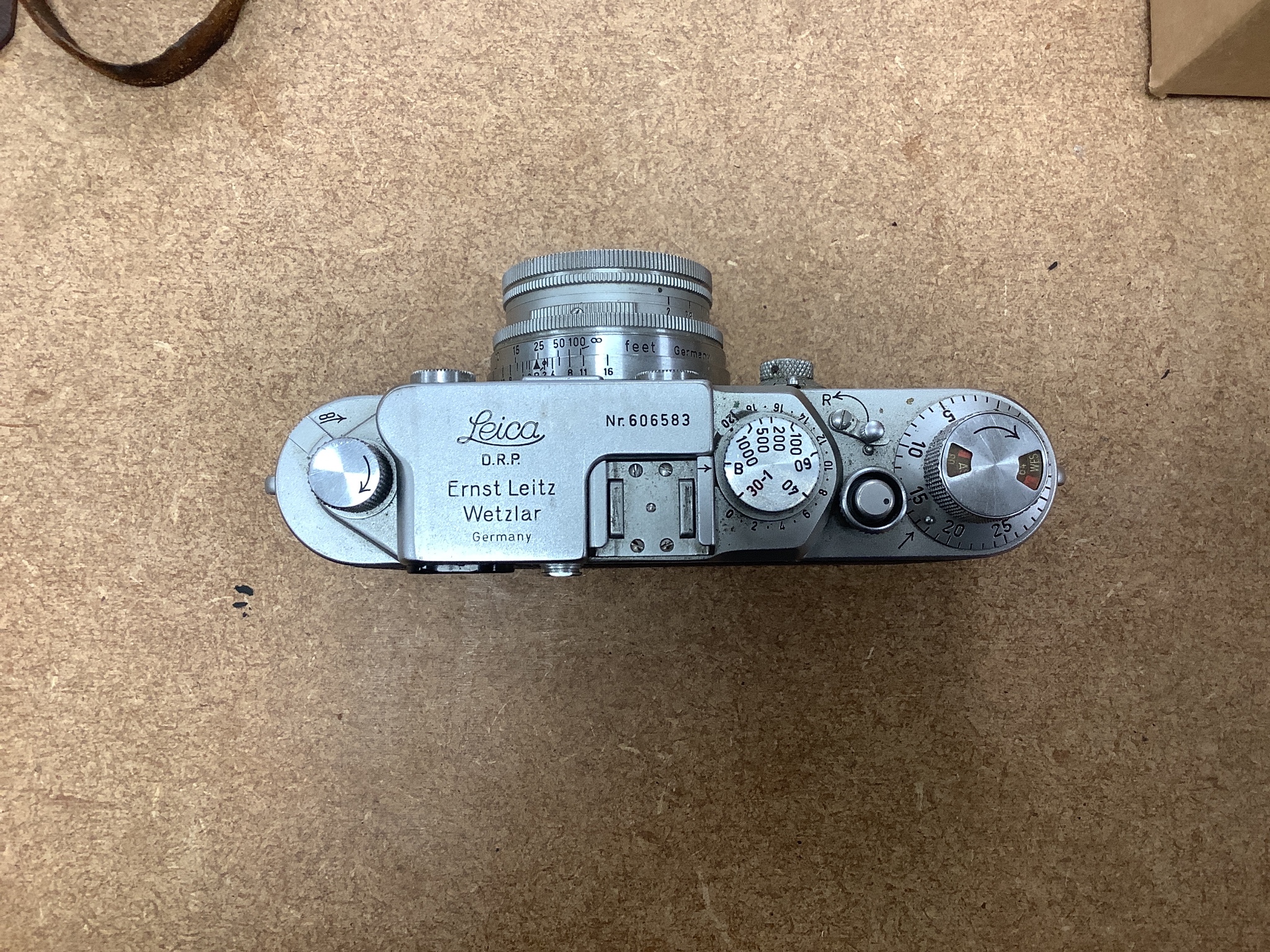 A cased Leica Ernst Leitz Wetzlar nr. 606583 camera together with light meter, lenses etc.